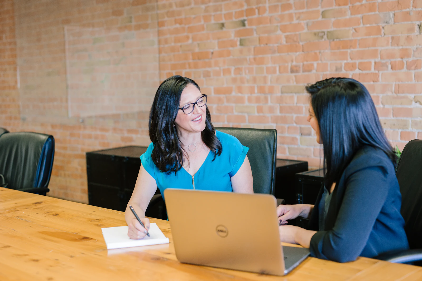 A client meeting around a table.