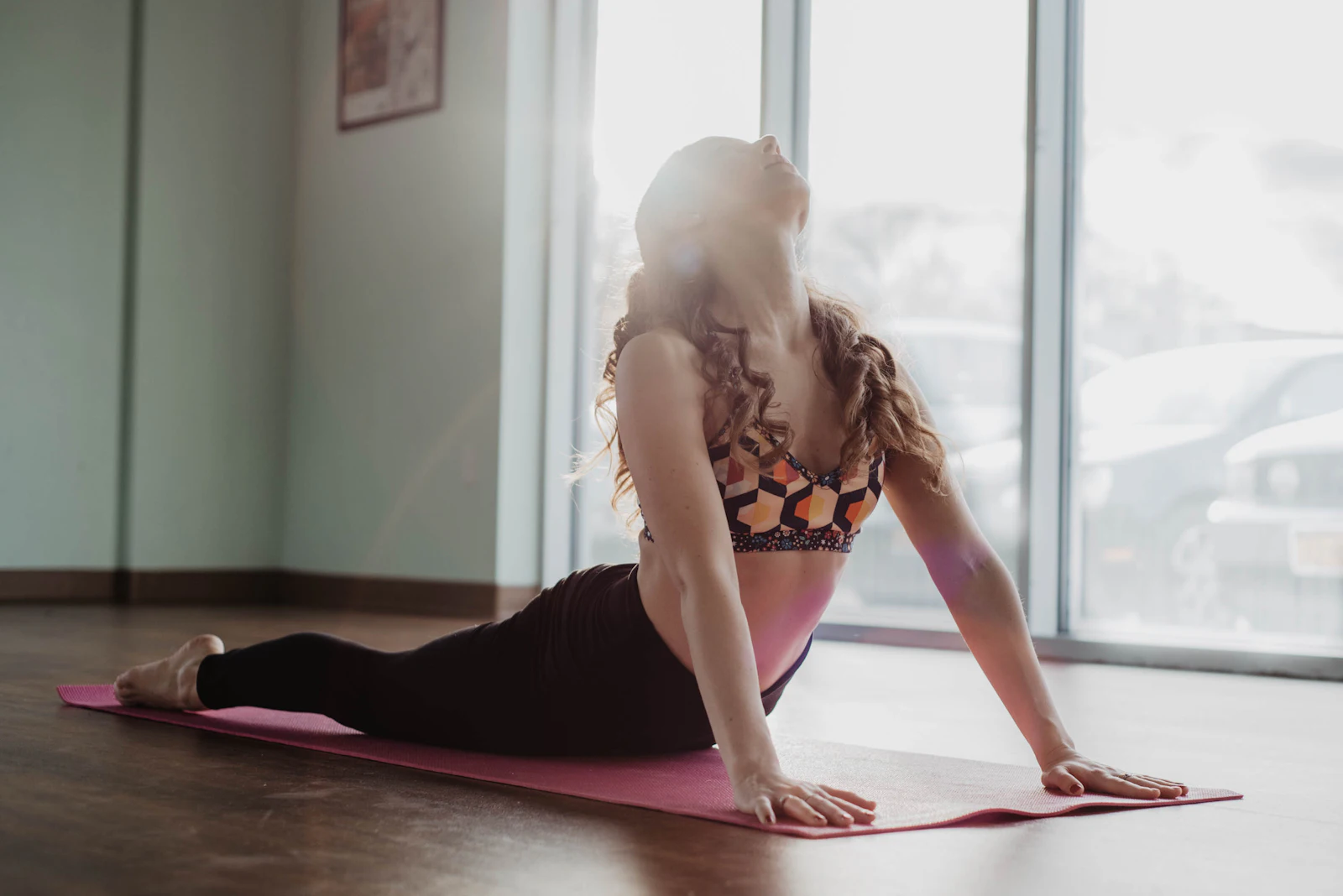 A yoga class in a bright studio.